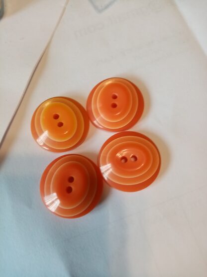 4 boutons pyramide orange