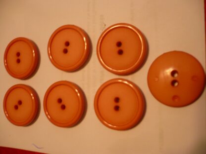 Lot 7 boutons ronds